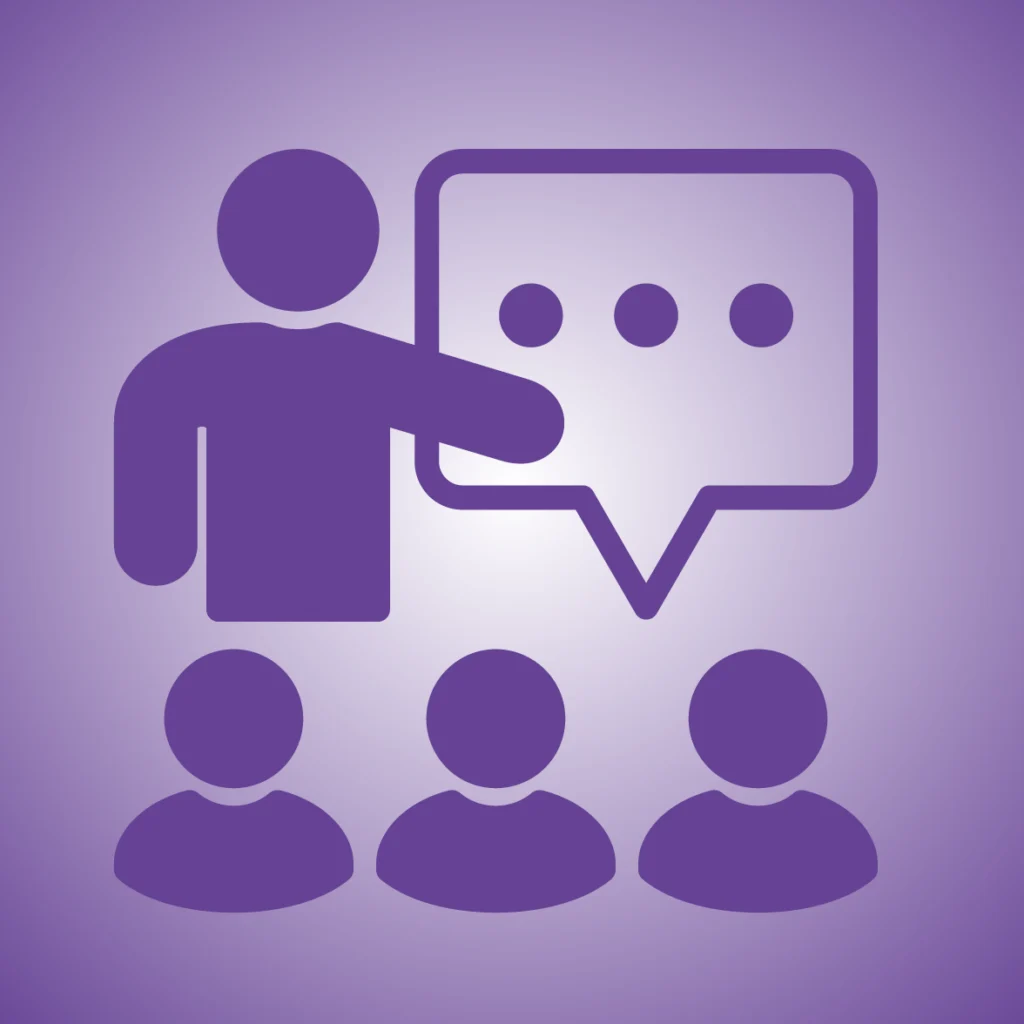 Purple graphic icon showing a person speaking to a small group with a speech bubble, representing a healthcare professional supporting communication and group participation for people living with aphasia.