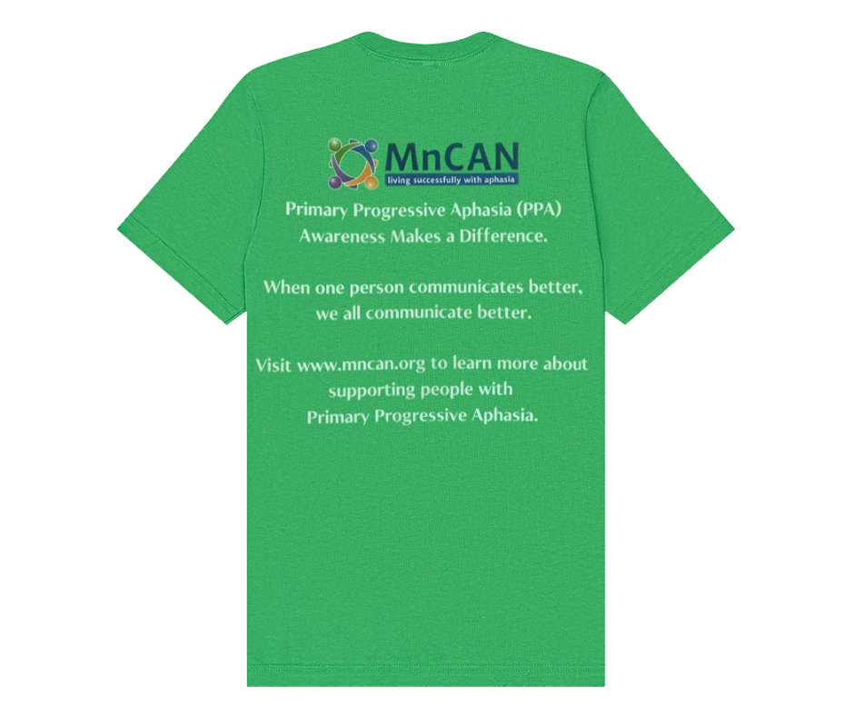 Back of a bright green MnCAN T-shirt featuring the MnCAN logo and the text: “Primary Progressive Aphasia (PPA) Awareness Makes a Difference. When one person communicates better, we all communicate better. Visit www.mncan.org to learn more about supporting people with Primary Progressive Aphasia.”