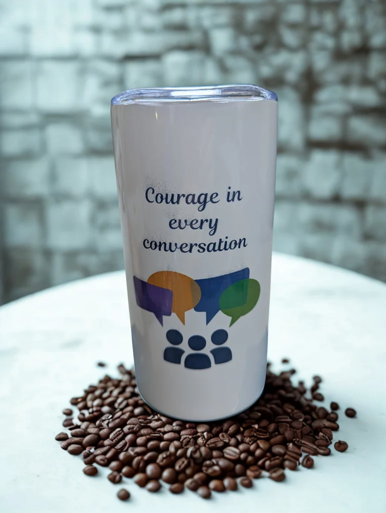 MnCAN tumbler front that says "Courage in every conversation"